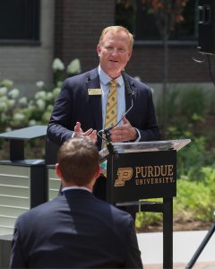 Man speaking at podium